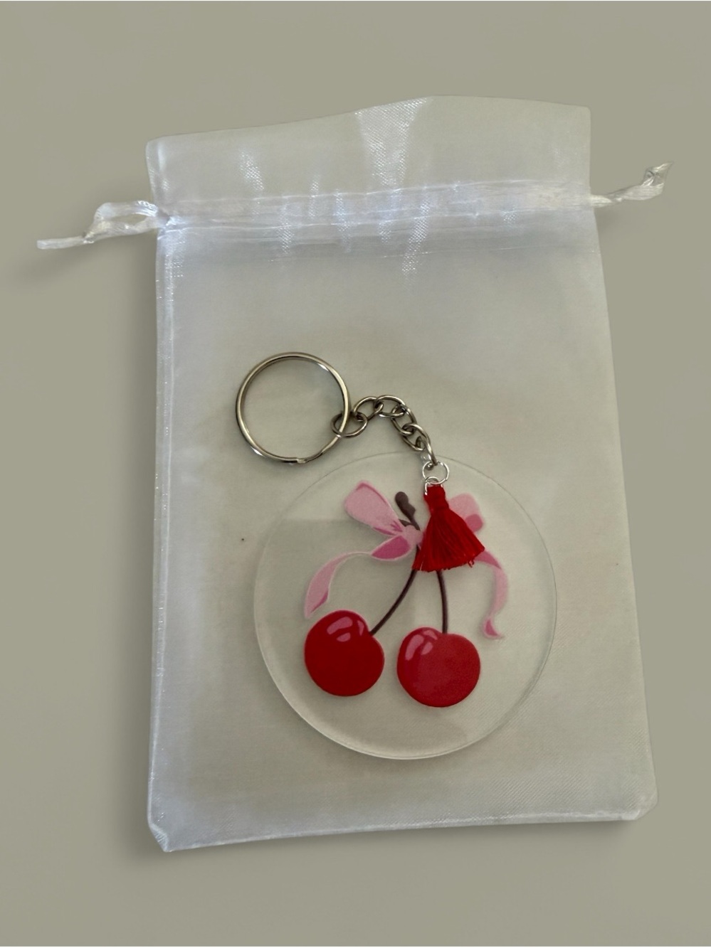 Cherry Graphic Acrylic Keychain with Pink Bow and Red Tassel